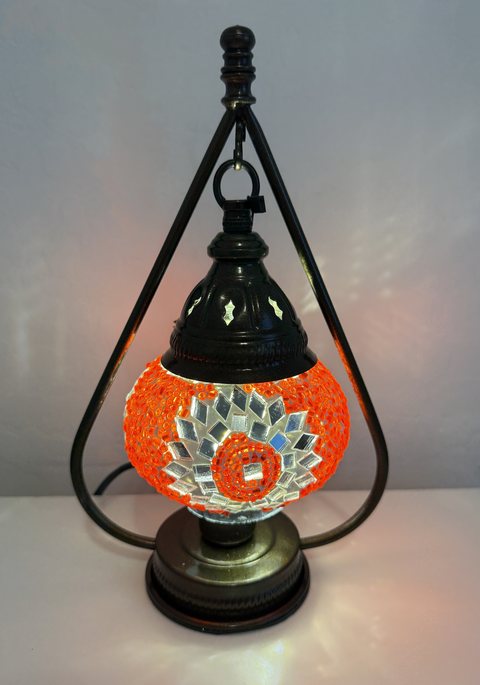 Tangerine Sunburst Teardrop Lamp, lit